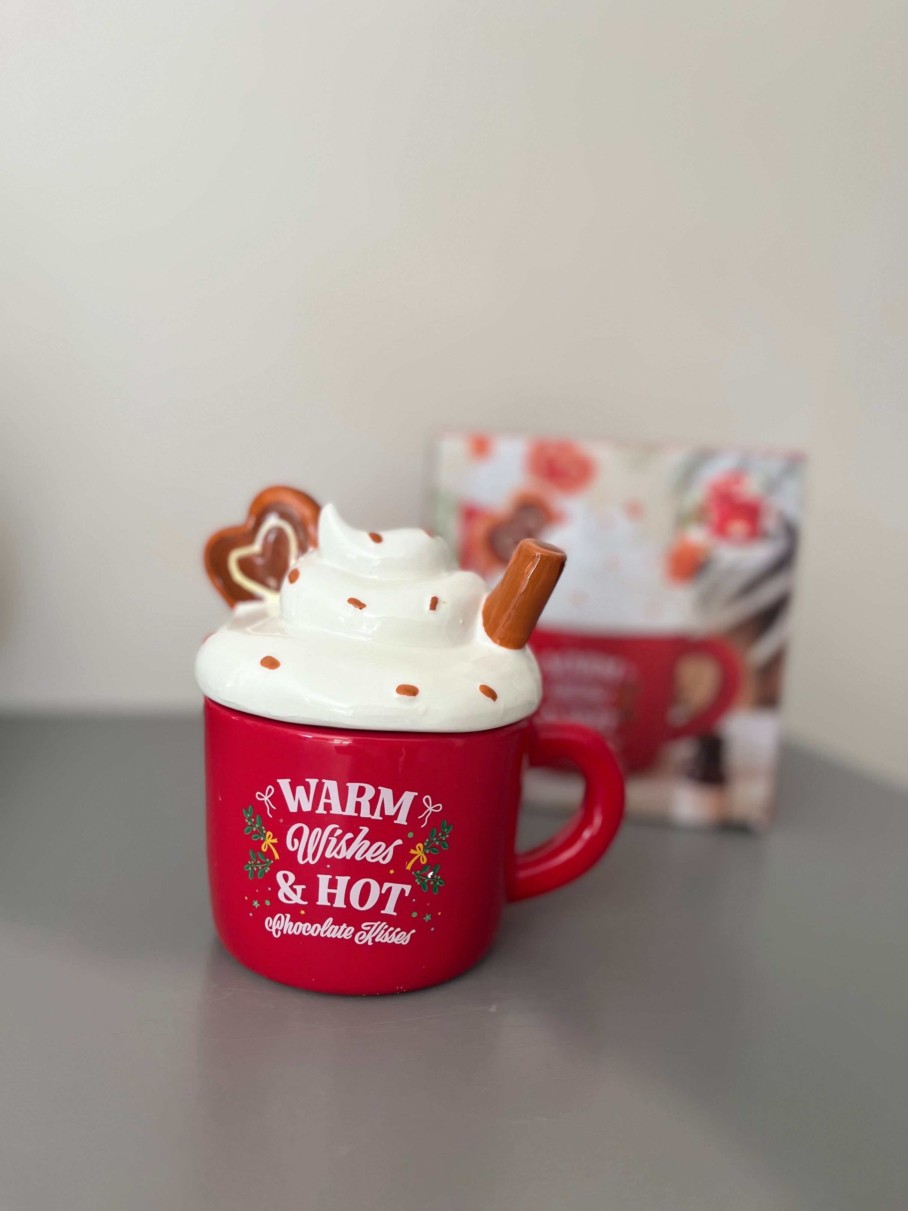 Chauffe-cire de Noël en forme de tasse de chocolat chaud.