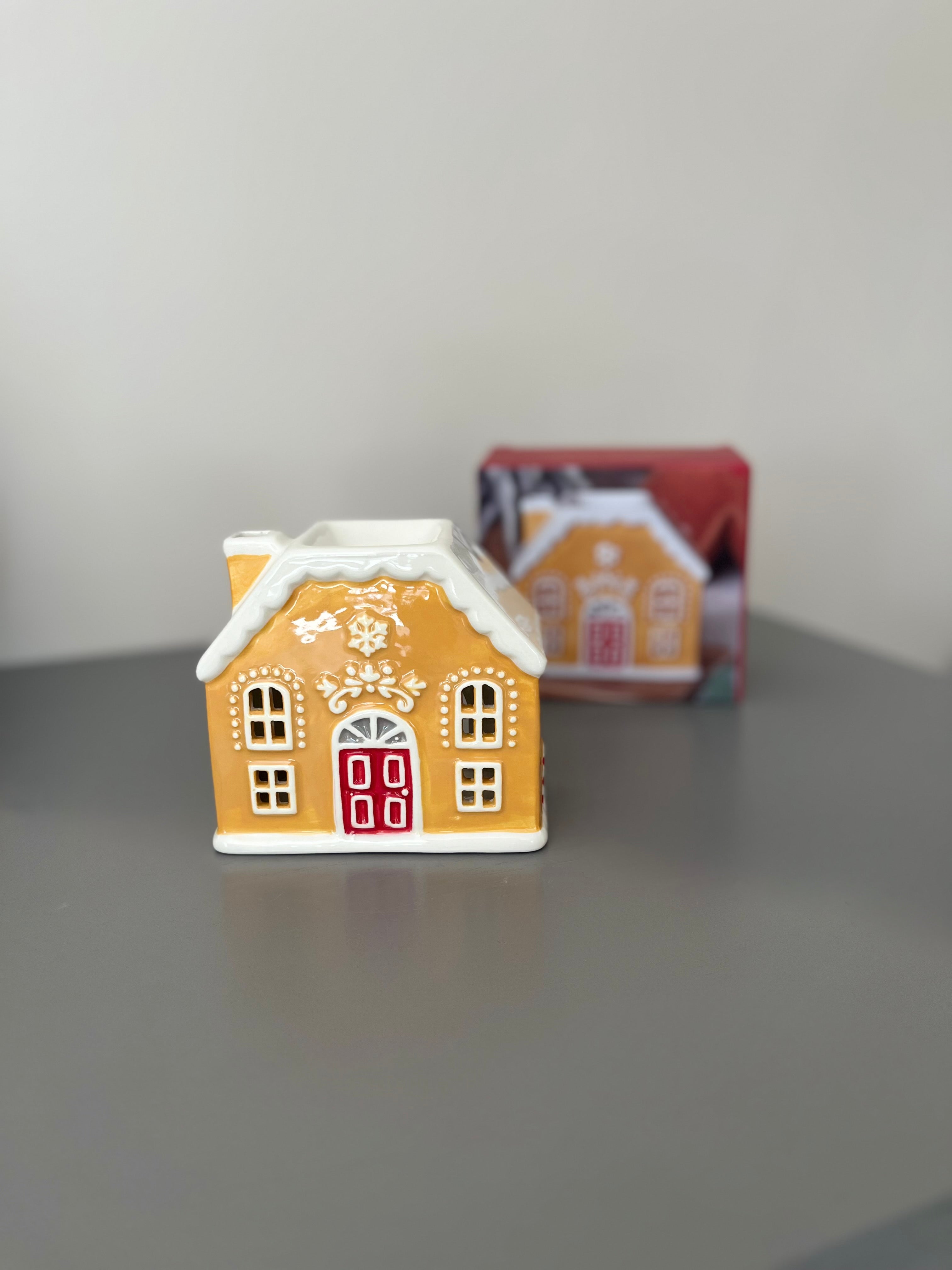 Chauffe-cire de Noël en forme de maison en pain d'épices